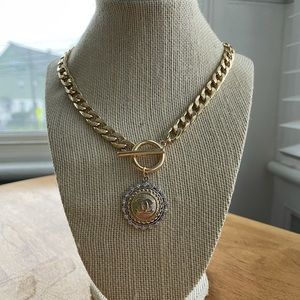 Upcycled Chanel button used to create a new necklace